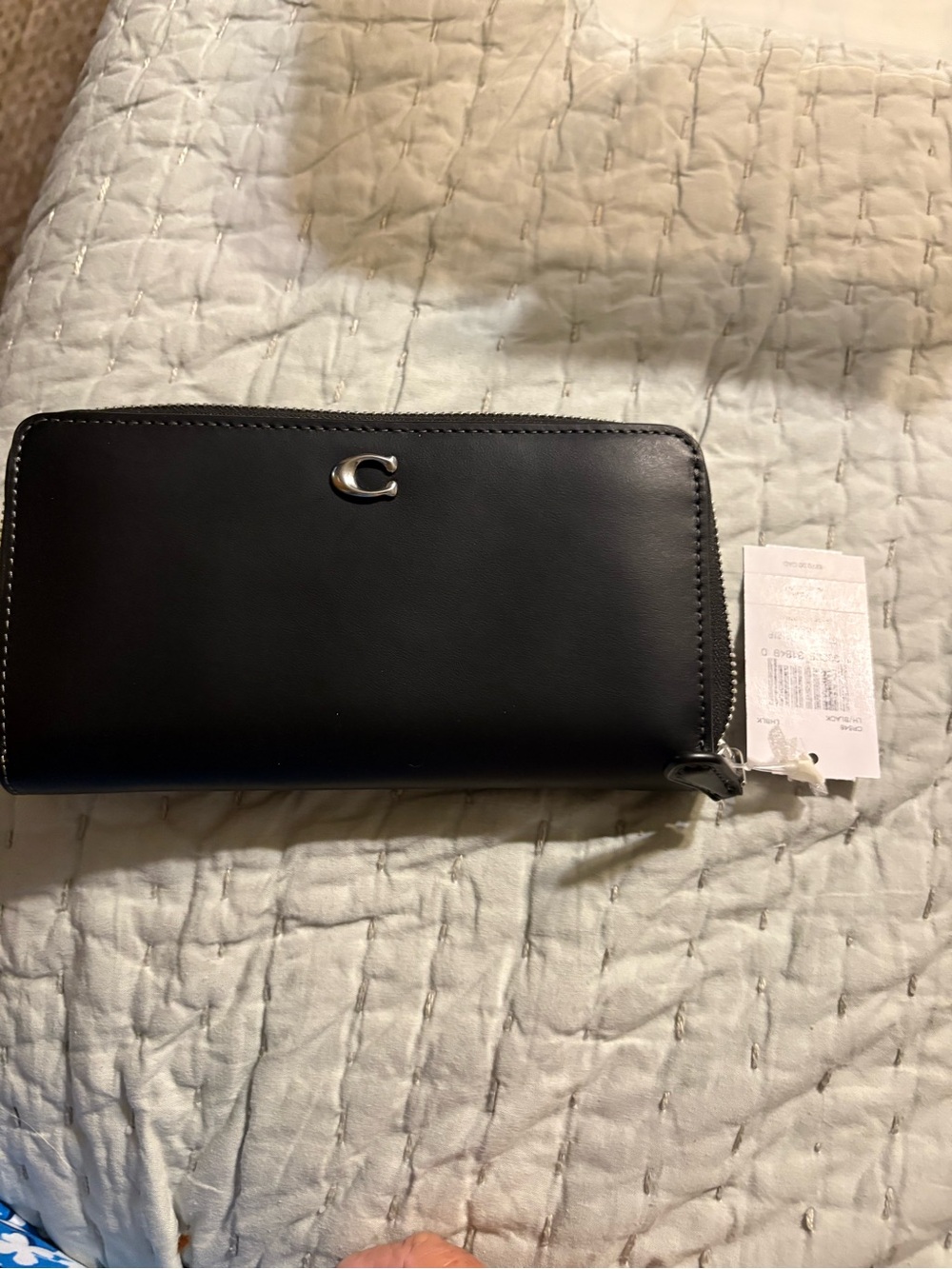 Coach Black Leather Zip-Around Wallet with Silver 'C' Accent